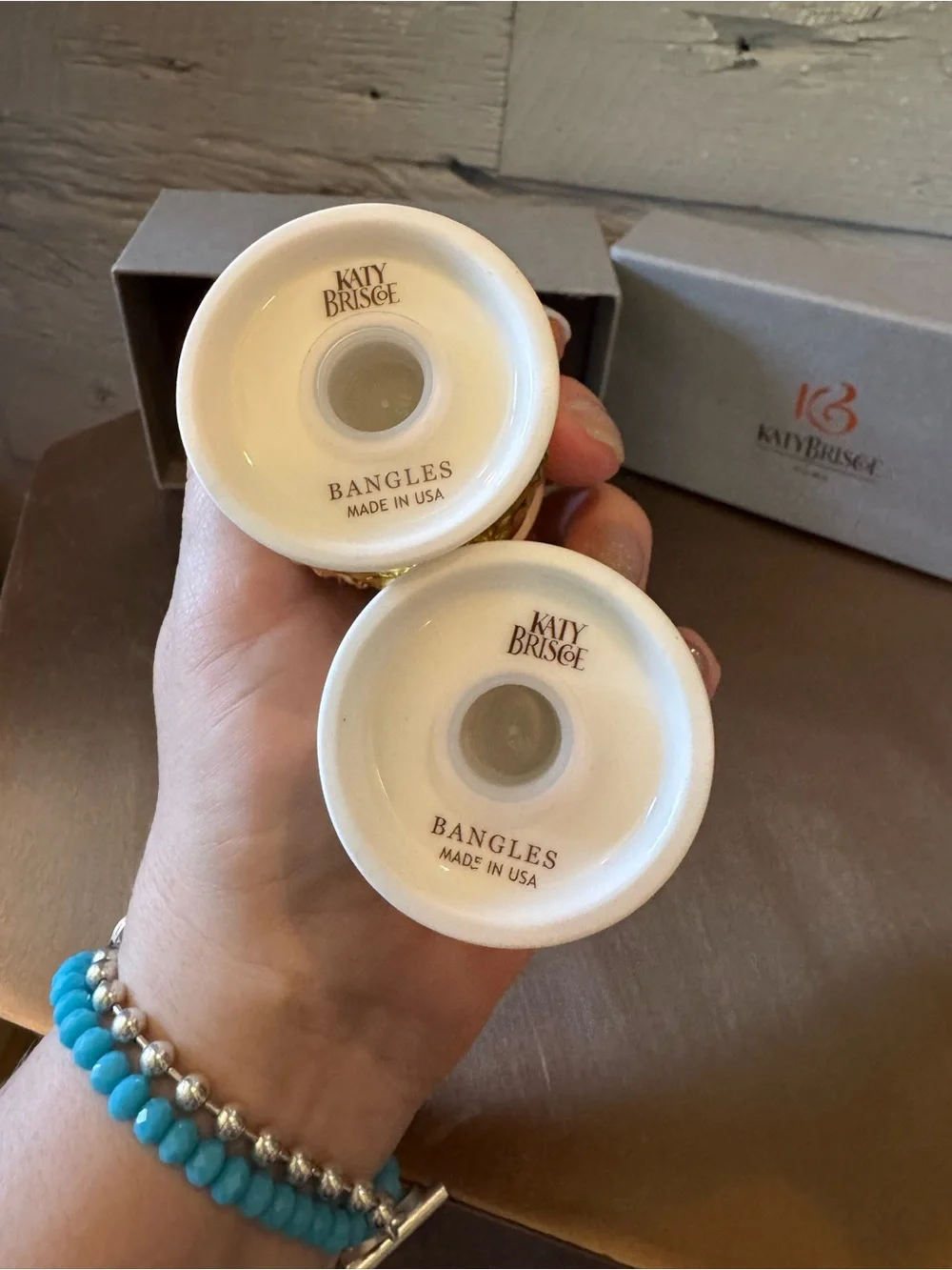 Katy Briscoe salt & pepper shakers made of bone white china with 24 carat gold.